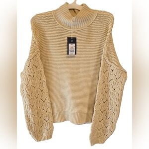 Elegant Cream Sweater with Lace Sleeves